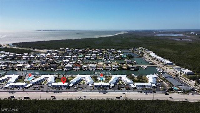 drone / aerial view featuring a water view