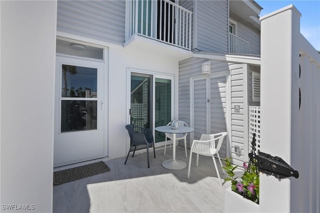 view of patio / terrace with a balcony