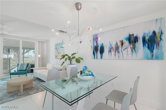 tiled dining room featuring a wall of windows, baseboards, and a chandelier