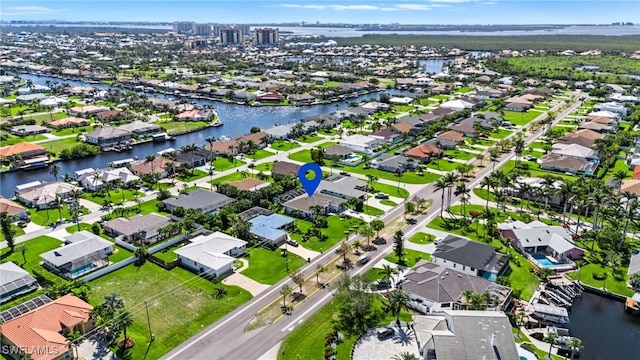 aerial view featuring a residential view and a water view