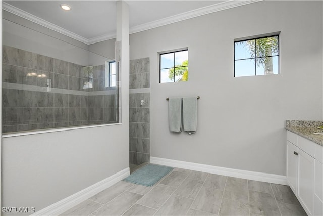 full bathroom with recessed lighting, crown molding, baseboards, walk in shower, and vanity