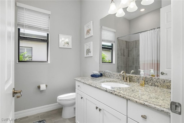 full bath featuring curtained shower, baseboards, toilet, and vanity