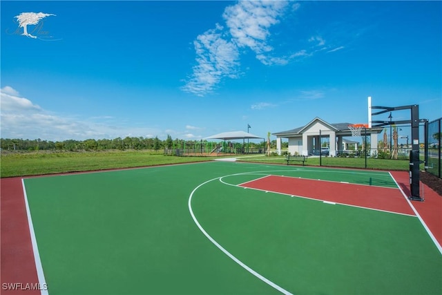 view of basketball court with a gazebo, community basketball court, and fence