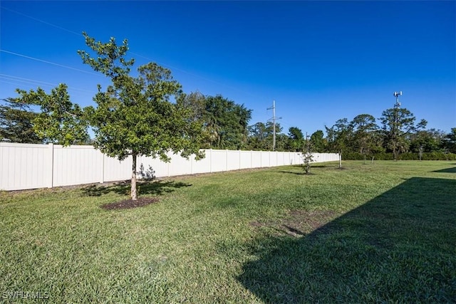 view of yard with fence