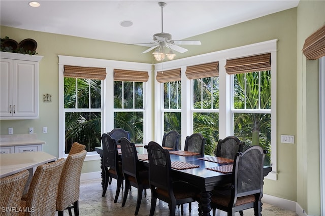 dining area featuring recessed lighting, a ceiling fan, and baseboards