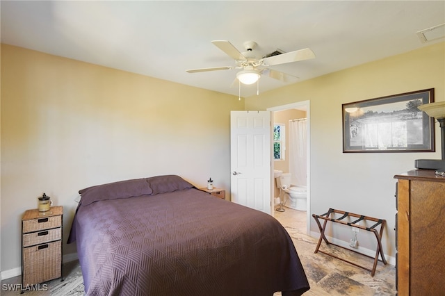 bedroom with visible vents, baseboards, ensuite bath, and ceiling fan