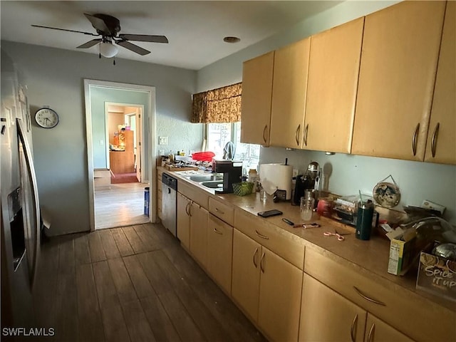 kitchen featuring ceiling fan, light countertops, dark wood-style flooring, and stainless steel appliances