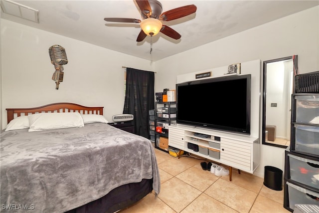 bedroom featuring ceiling fan and light tile patterned flooring