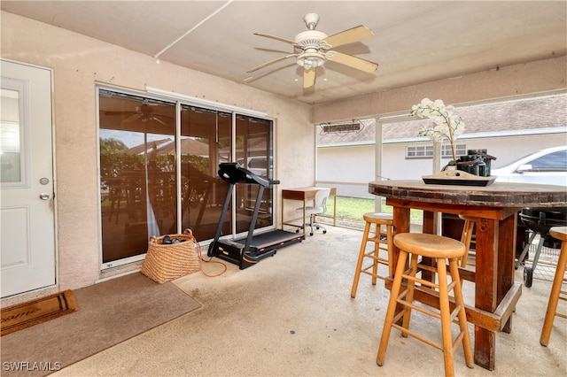 interior space with a ceiling fan