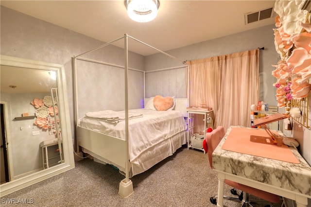 bedroom featuring visible vents and carpet flooring