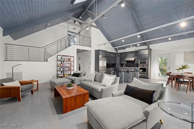 16886 Captiva Dr, Captiva, FL 33924 - living room with high vaulted ceiling and beam ceiling