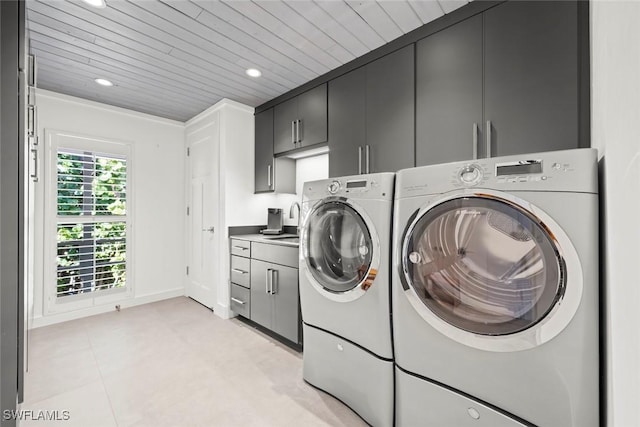 16886 Captiva Dr, Captiva, FL 33924 - laundry area with washer and clothes dryer, wooden ceiling, a sink, cabinet space, and recessed lighting