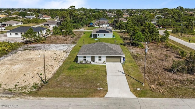 birds eye view of property with a residential view