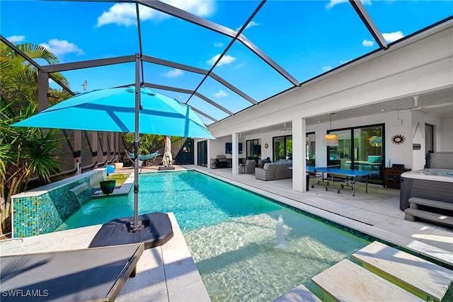 outdoor pool with a patio, a ceiling fan, an outdoor hot tub, a lanai, and an outdoor hangout area