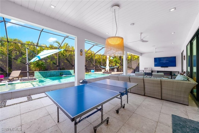 recreation room with recessed lighting, a swimming pool, and ceiling fan