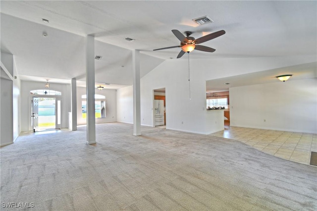 interior space with visible vents, baseboards, ceiling fan, and carpet floors