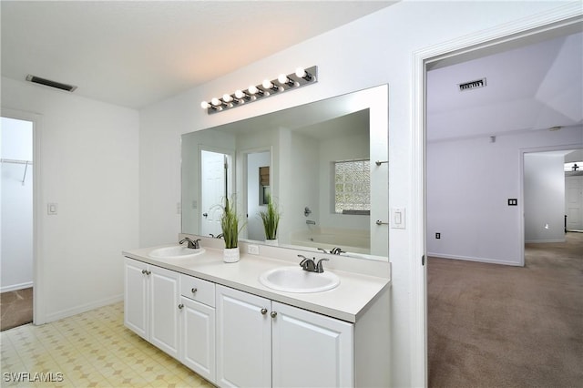 full bath with a sink, visible vents, and a bath