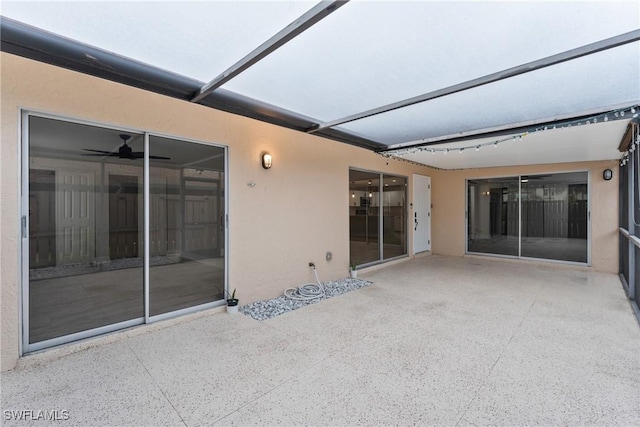 view of patio / terrace with a lanai