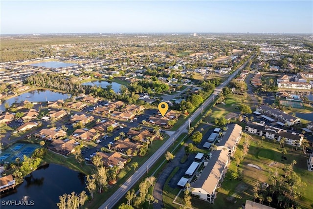 aerial view with a water view and a residential view