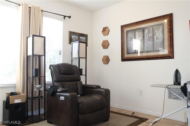 sitting room featuring baseboards