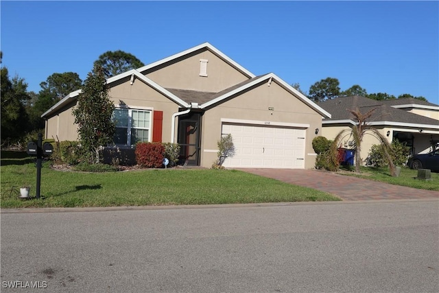 single story home with stucco siding, decorative driveway, an attached garage, and a front lawn