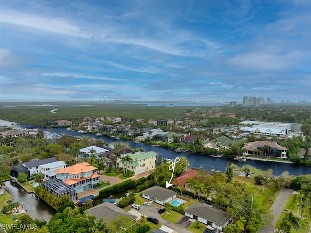 aerial view featuring a residential view and a water view