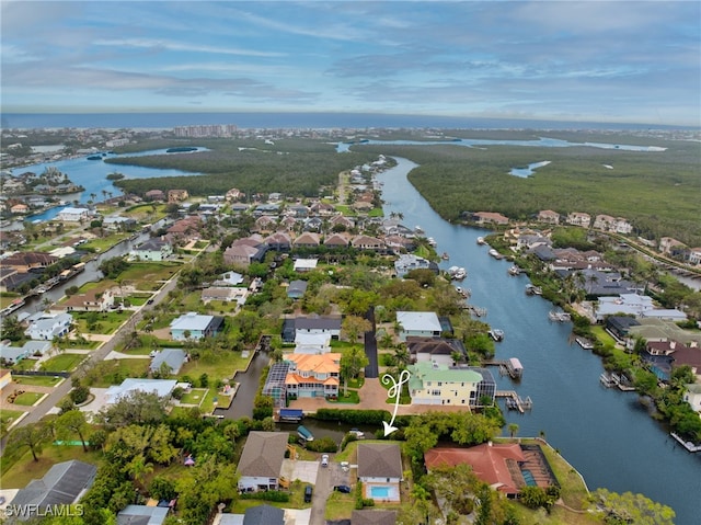 aerial view featuring a residential view and a water view