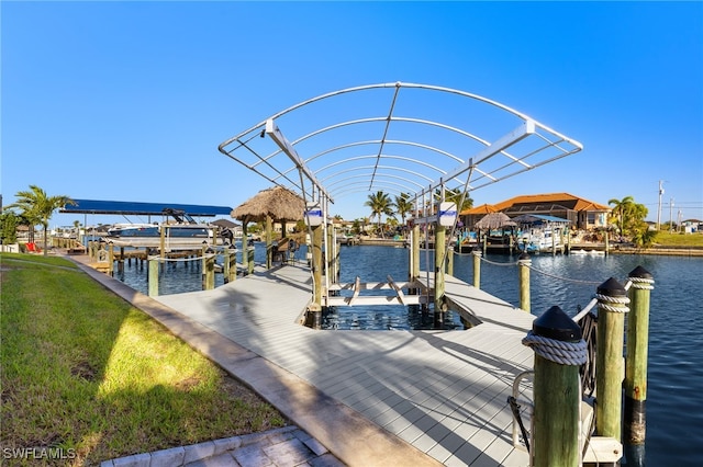 3303 NW 14th St, Cape Coral, FL 33993 - dock area featuring a water view and boat lift