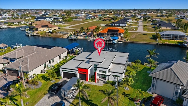 3303 NW 14th St, Cape Coral, FL 33993 - drone / aerial view featuring a water view and a residential view