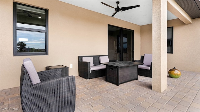 view of patio featuring outdoor lounge area and ceiling fan