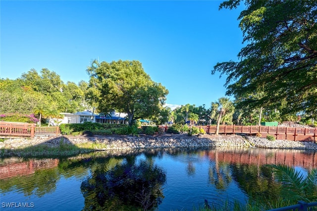 property view of water with fence