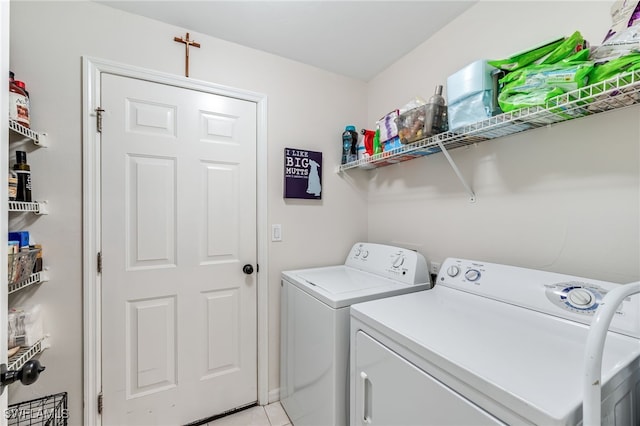 laundry room featuring washer and clothes dryer and laundry area