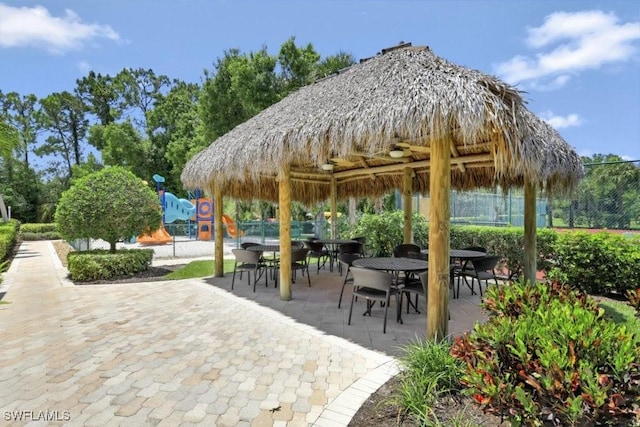 view of patio featuring a gazebo and fence