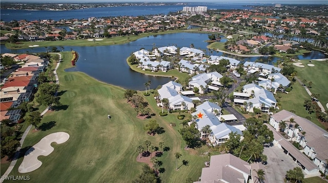 birds eye view of property featuring a residential view, golf course view, and a water view