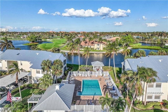 drone / aerial view featuring a residential view and a water view