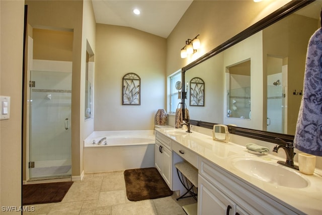 bathroom featuring a shower stall, a bath, double vanity, and a sink