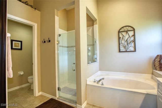 full bathroom featuring toilet, a shower stall, a bath, and baseboards