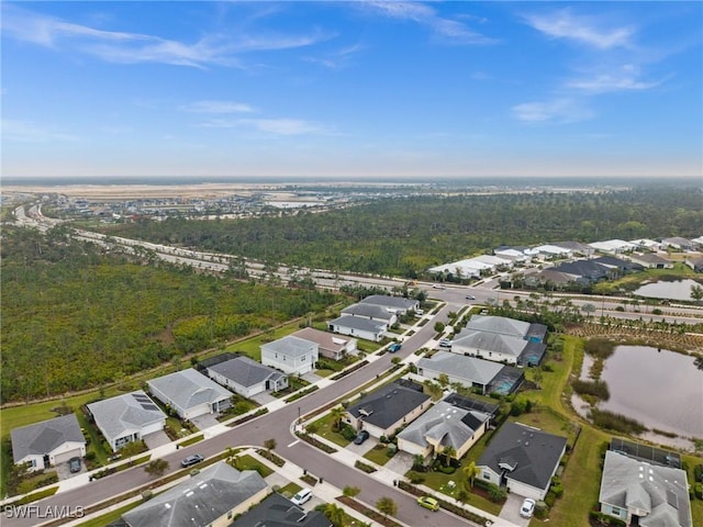 aerial view with a residential view and a water view