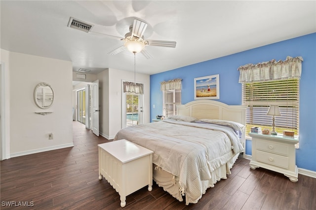 bedroom with visible vents, a ceiling fan, access to outside, baseboards, and dark wood-style flooring