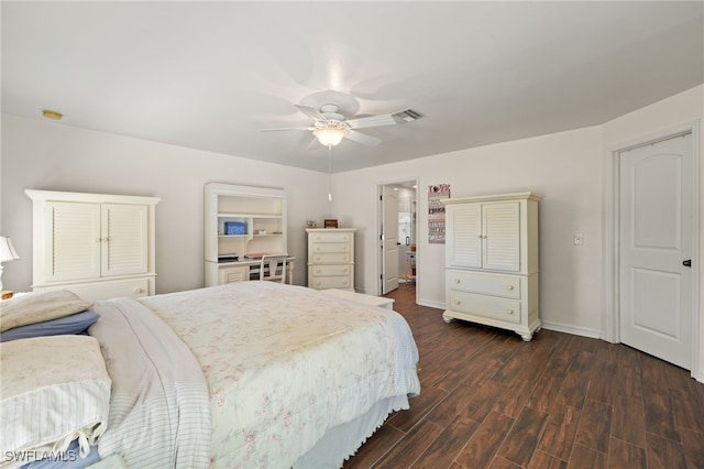 bedroom featuring ceiling fan, visible vents, baseboards, and dark wood-style floors