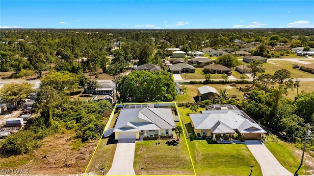 drone / aerial view with a forest view