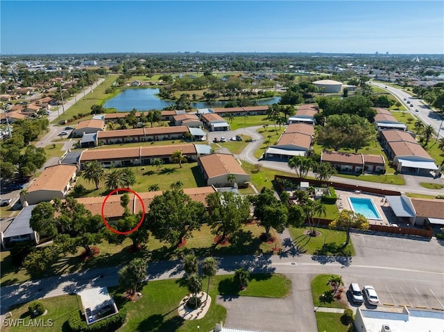 drone / aerial view with a water view