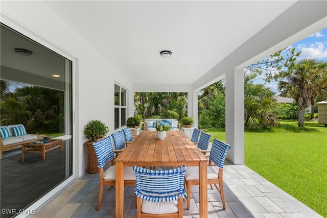 view of patio / terrace with outdoor lounge area and outdoor dining area