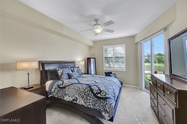 bedroom featuring light carpet, baseboards, ceiling fan, and access to exterior