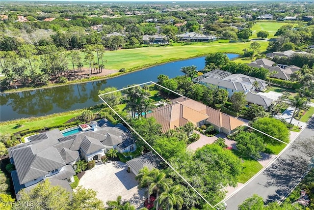 birds eye view of property featuring a water view and a residential view