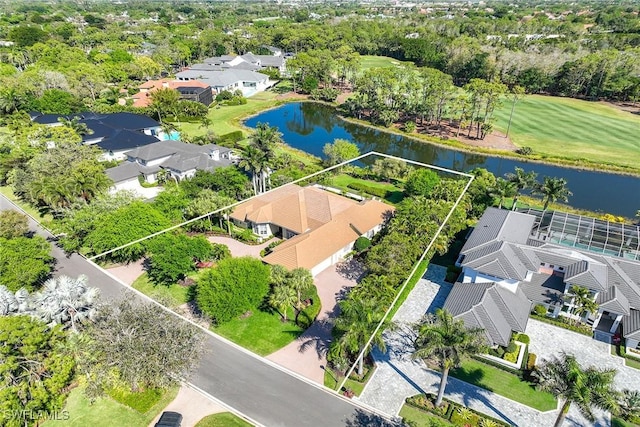 bird's eye view featuring a residential view and a water view