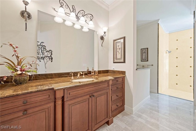 full bath featuring baseboards, vanity, and crown molding