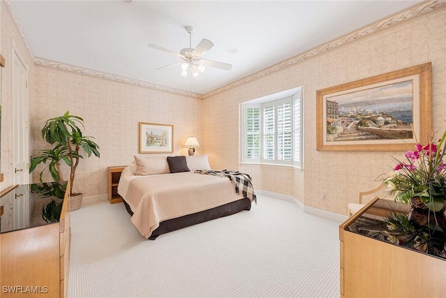 carpeted bedroom featuring ceiling fan, wallpapered walls, and baseboards