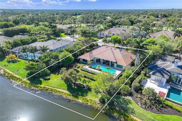 aerial view with a view of trees and a water view