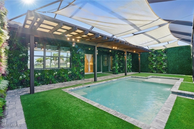 outdoor pool featuring a pergola and a yard